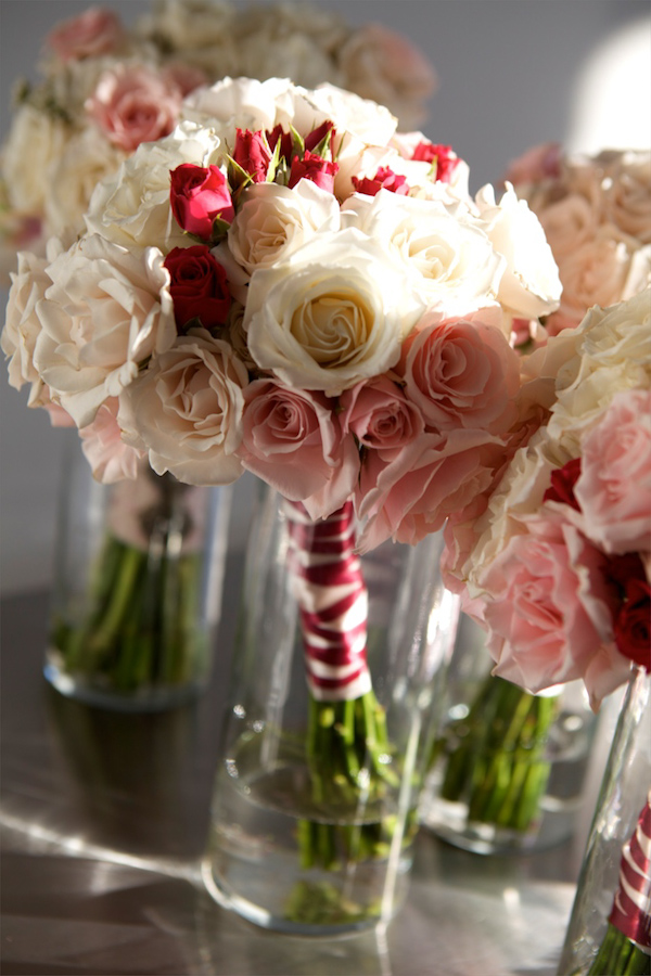 photo by New York City based wedding photographer Karen Hill - pink, white, and red rose bouquets